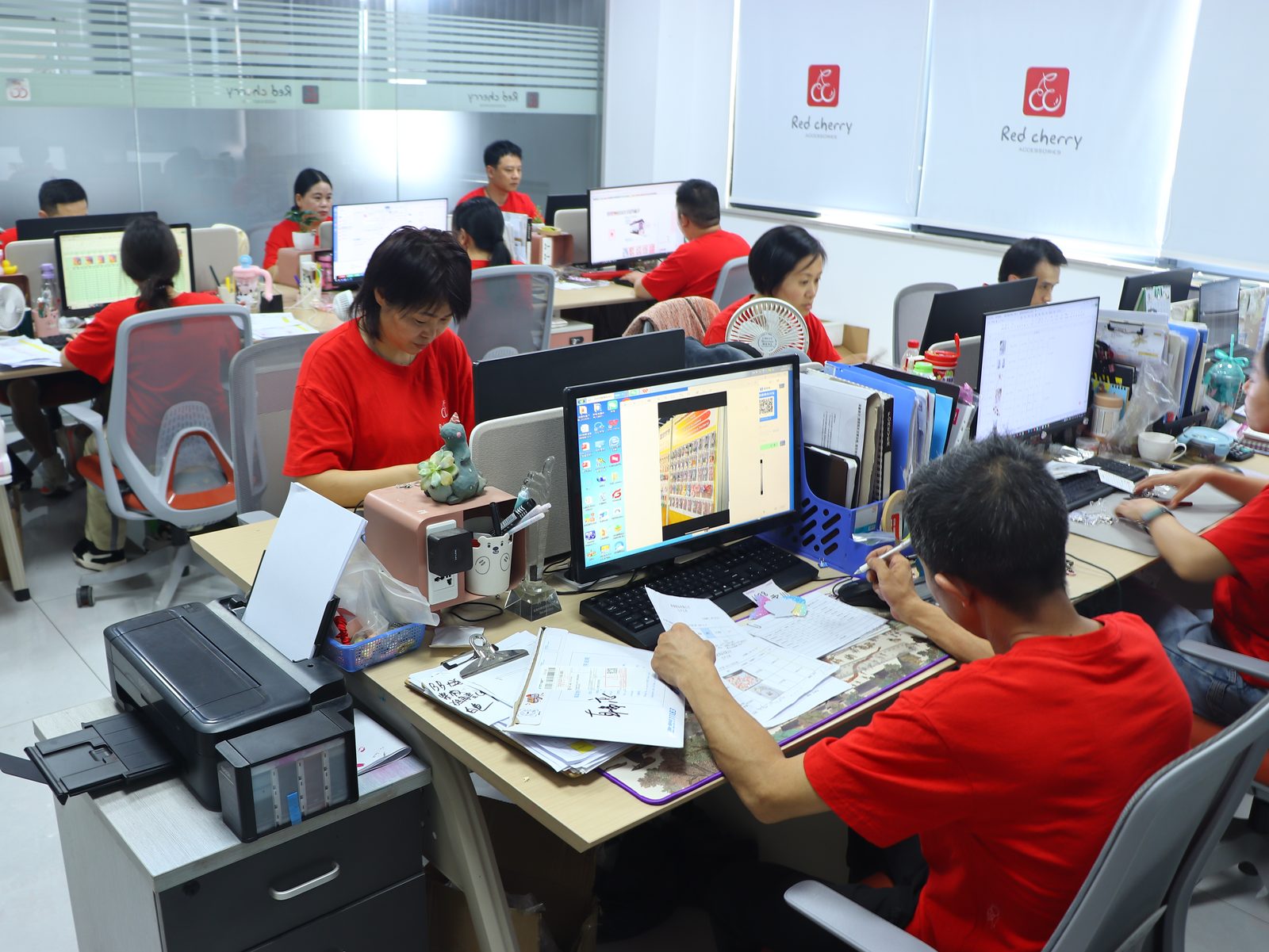 Red Cherry design office — charm designers working on CAD models in Yiwu factory