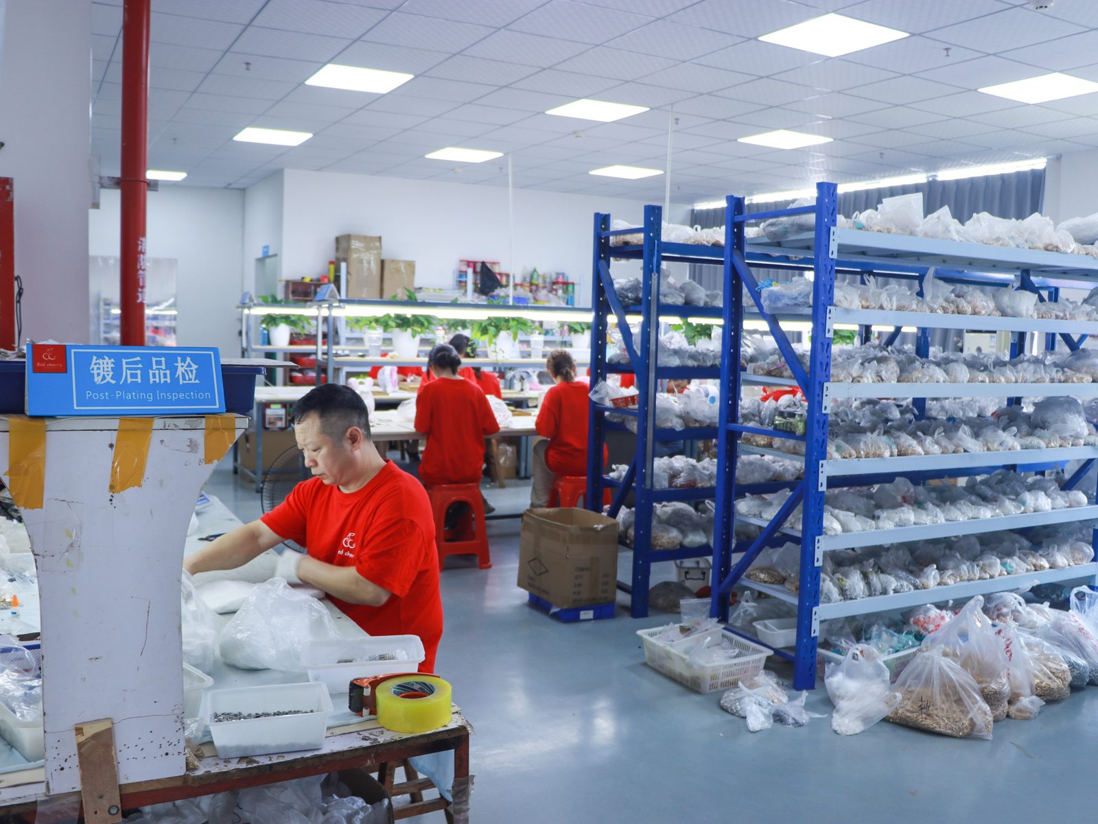 Post-plating quality inspection station — 100% visual inspection of charm pendants
